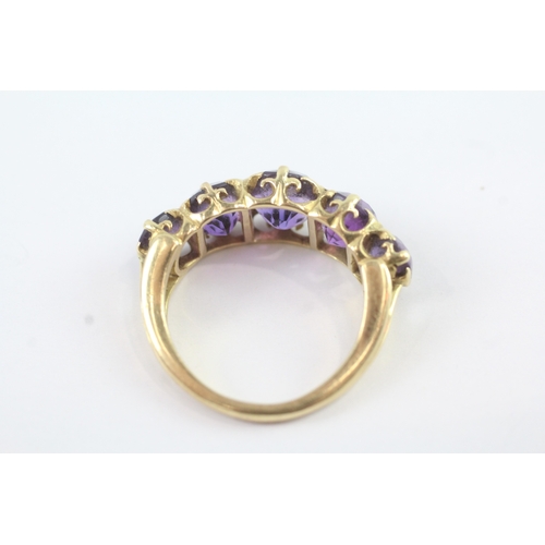 184 - 18ct gold amethyst five stone ring (5.8g)