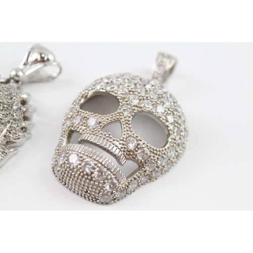 212 - Collection of Sterling Silver & Steel Encrusted Skulls Pendants x 2 104g