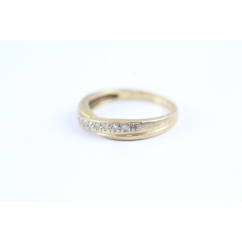 26 - 9ct gold diamond channel set dress ring (2.4g) Size L 1/2