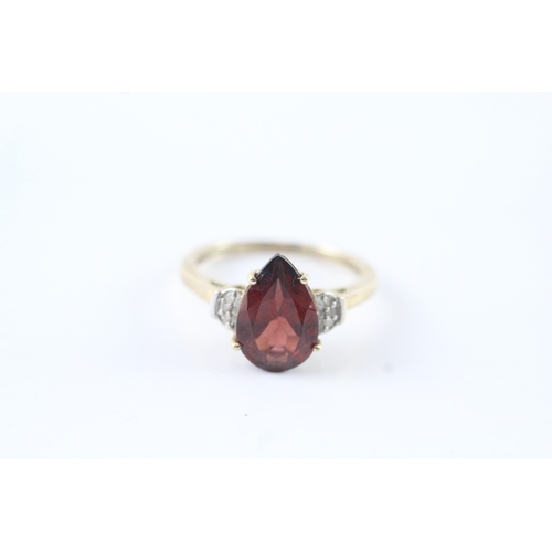 3 - 9ct gold garnet & diamond claw set dress ring (2.5g) Size N