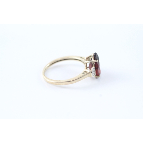 3 - 9ct gold garnet & diamond claw set dress ring (2.5g) Size N