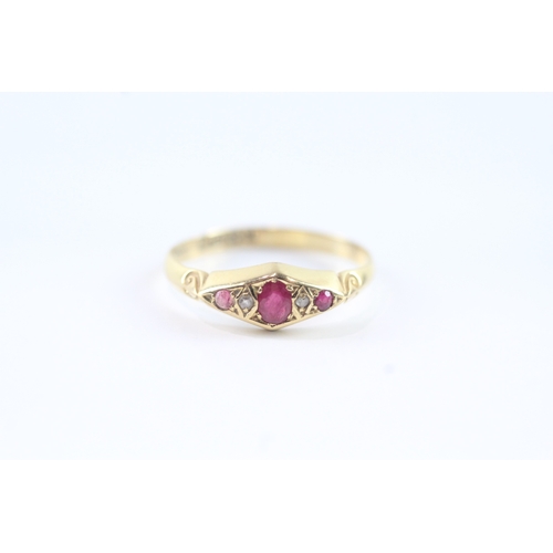 34 - 18ct gold ruby & diamond flush set dress ring (2g) as seen - misshapen Size S