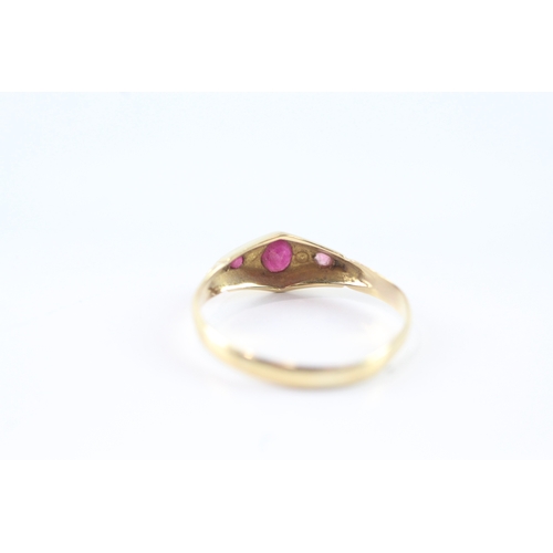 34 - 18ct gold ruby & diamond flush set dress ring (2g) as seen - misshapen Size S