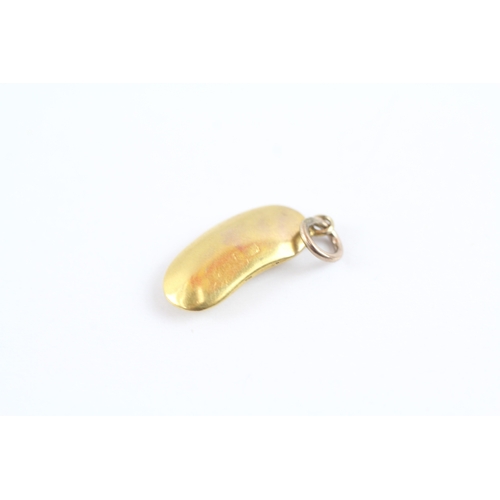 36 - 9ct gold lucky bean charm (0.6g)