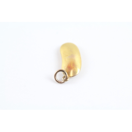 36 - 9ct gold lucky bean charm (0.6g)