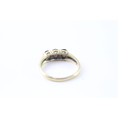 37 - 14ct gold diamond & sapphire trilogy dress ring (2.8g) Size M