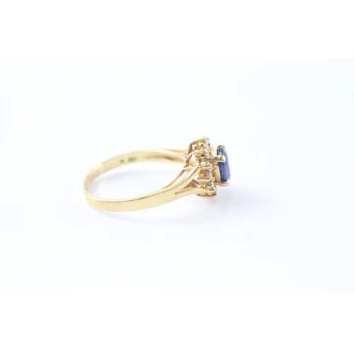 38 - 18ct gold claw set sapphire & diamond cluster dress ring (2.6g) Size L