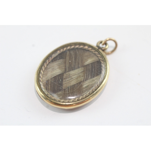 4 - 9ct gold back + front mourning locket (4.8g)