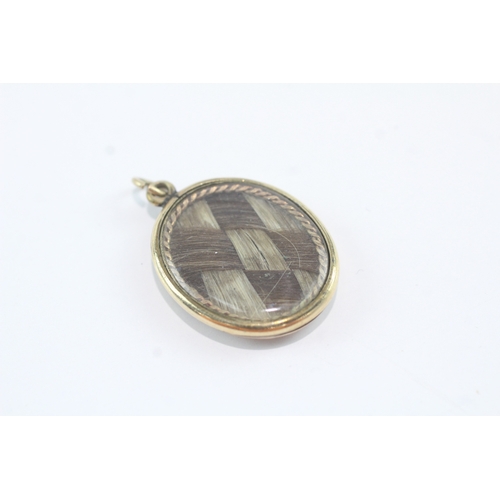 4 - 9ct gold back + front mourning locket (4.8g)