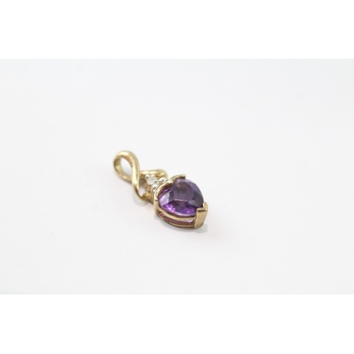 44 - 2 x 9ct gold amethyst and diamond set pendants (1.5g)