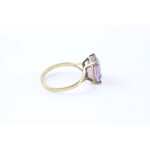 47 - 9ct gold amethyst claw set dress ring (1.9g) Size L 1/2