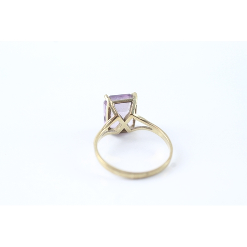 47 - 9ct gold amethyst claw set dress ring (1.9g) Size L 1/2