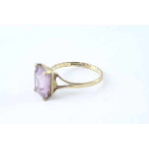 47 - 9ct gold amethyst claw set dress ring (1.9g) Size L 1/2