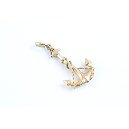 49 - 9ct gold anchor charm (1.3g)