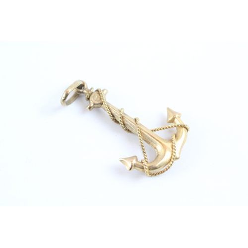 49 - 9ct gold anchor charm (1.3g)