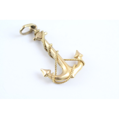 49 - 9ct gold anchor charm (1.3g)