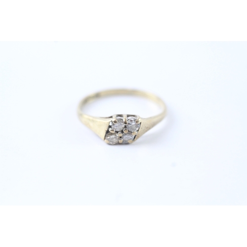 53 - 9ct gold diamond four stone dress ring (1.3g) Size L