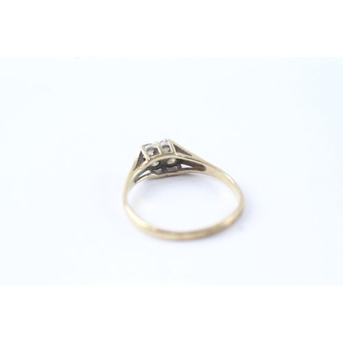 53 - 9ct gold diamond four stone dress ring (1.3g) Size L