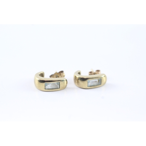 66 - 9ct gold blue topaz half hoop earrings (2.7g)