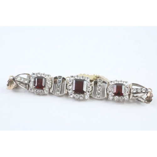 7 - 9ct gold & silver white sapphire & garnet cushion cluster bracelet (14.2g)