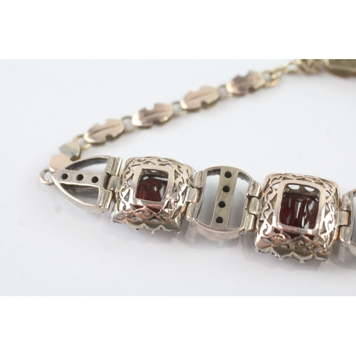 7 - 9ct gold & silver white sapphire & garnet cushion cluster bracelet (14.2g)