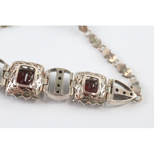 7 - 9ct gold & silver white sapphire & garnet cushion cluster bracelet (14.2g)