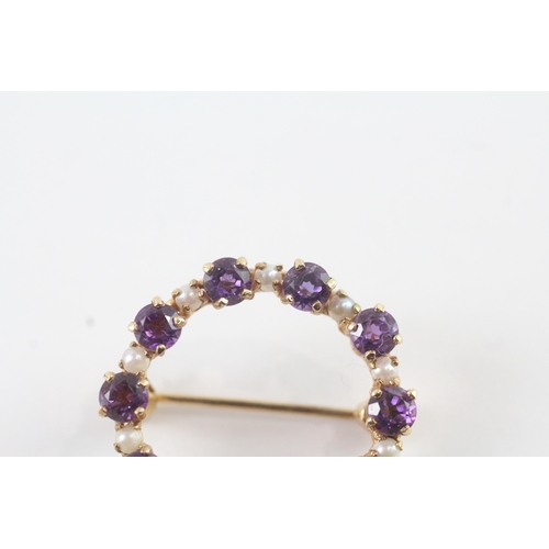 73 - 9ct gold pearl and amethyst set halo brooch (3.9g)