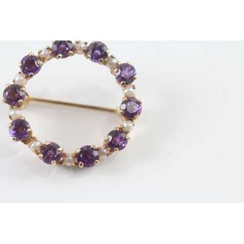 73 - 9ct gold pearl and amethyst set halo brooch (3.9g)