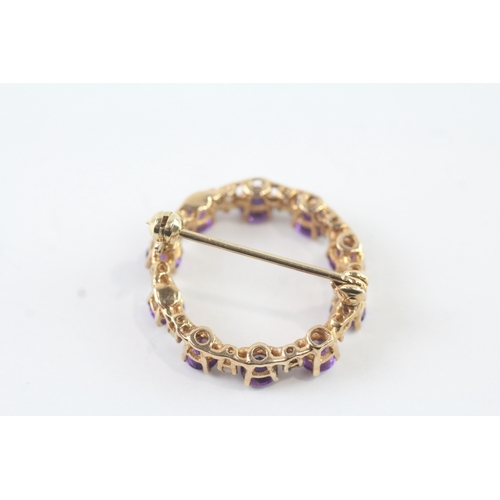 73 - 9ct gold pearl and amethyst set halo brooch (3.9g)