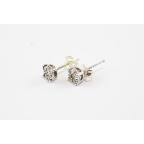 9 - 9ct white diamond stud earrings (1.1g)