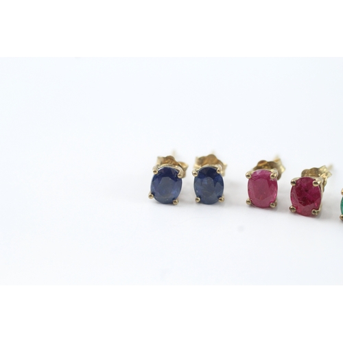 91 - 3 x 9ct gold sapphire, ruby and emerald stud earrings (1.7g)