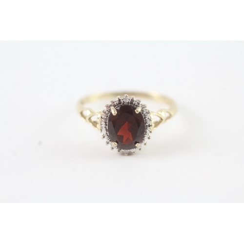 92 - 9ct gold diamond and garnet halo ring (2.2g) Size R 1/2