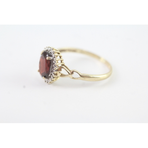 92 - 9ct gold diamond and garnet halo ring (2.2g) Size R 1/2