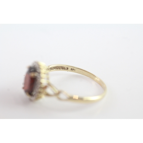 92 - 9ct gold diamond and garnet halo ring (2.2g) Size R 1/2