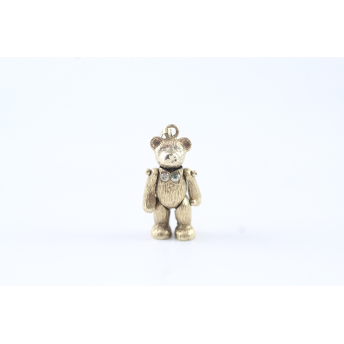 94 - 9ct gold white gemstone articulated teddy bear charm (2.7g)