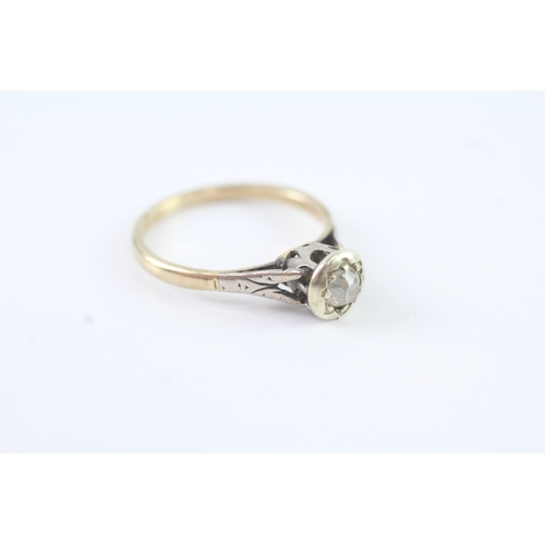 97 - 9ct gold and platinum diamond solitaire ring (2.3g) Size N