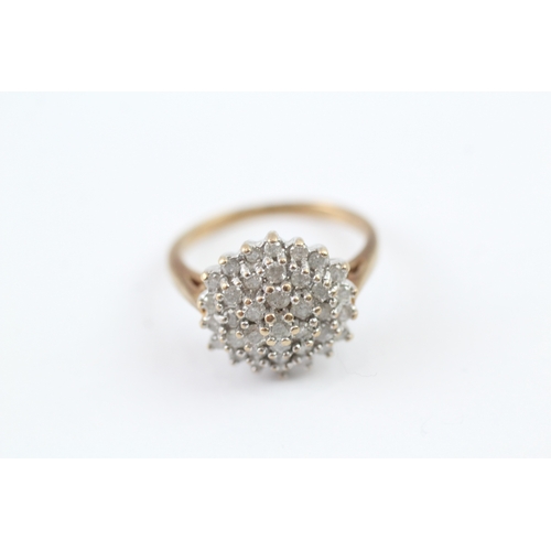 107 - 9ct gold diamond set cluster ring (4.5g) Size P