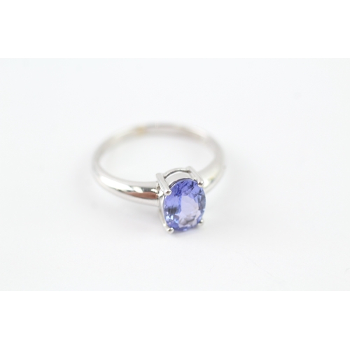 109 - 9ct white gold oval cut tanzanite set solitaire ring (2.3g) Size L