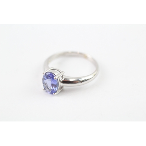 109 - 9ct white gold oval cut tanzanite set solitaire ring (2.3g) Size L