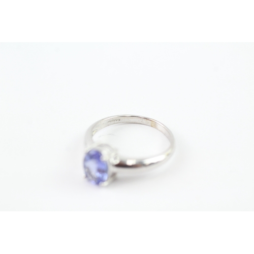 109 - 9ct white gold oval cut tanzanite set solitaire ring (2.3g) Size L