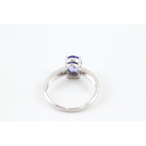 109 - 9ct white gold oval cut tanzanite set solitaire ring (2.3g) Size L