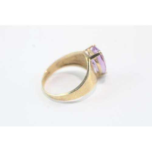 11 - 9ct gold amethyst claw set dress ring (4.1g) Size R 1/2