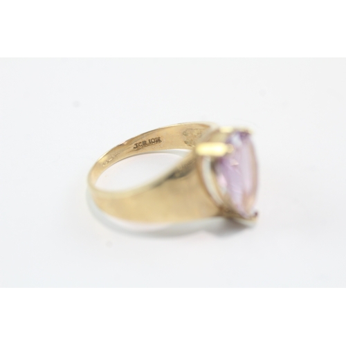 11 - 9ct gold amethyst claw set dress ring (4.1g) Size R 1/2