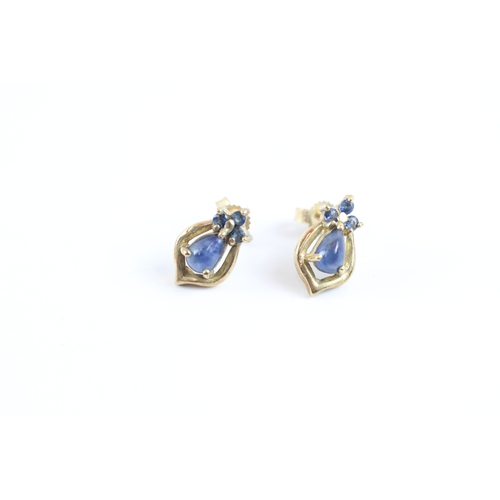 111 - 9ct gold sapphire pear stud earrings (2.1g)