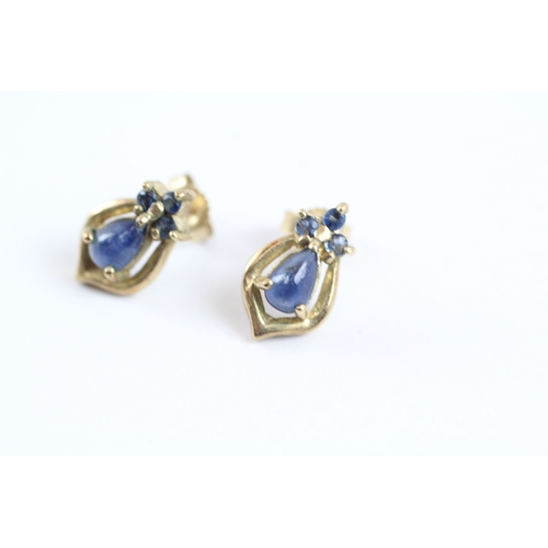 111 - 9ct gold sapphire pear stud earrings (2.1g)