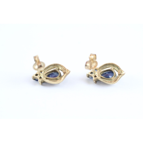 111 - 9ct gold sapphire pear stud earrings (2.1g)