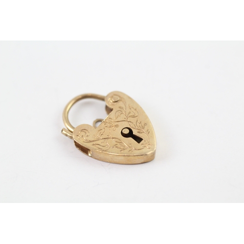 113 - 9ct gold lock charm (2.4g)