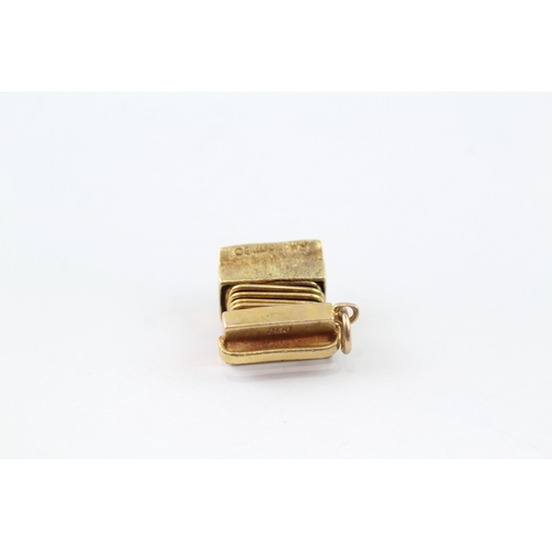 115 - 9ct gold accordion charm (2.1g)