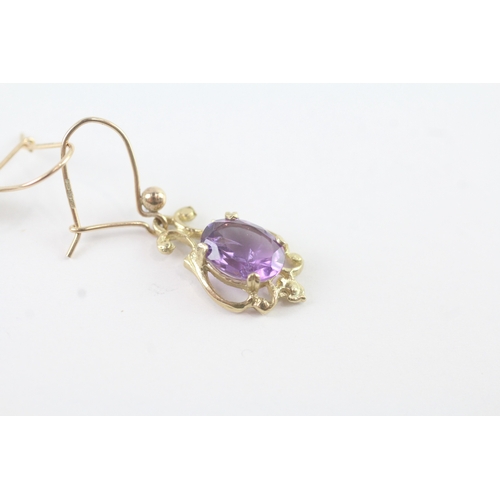 136 - 9ct gold amethyst ornate drop earrings (2.5g)