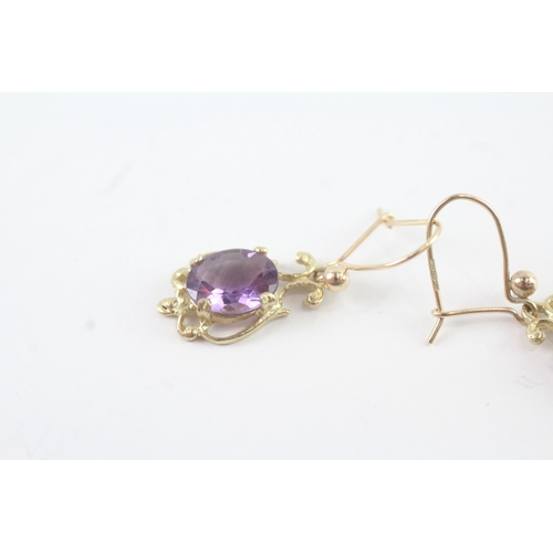 136 - 9ct gold amethyst ornate drop earrings (2.5g)